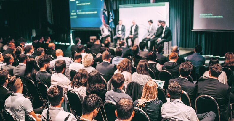 What Are the Benefits of Organizing a Business Conference